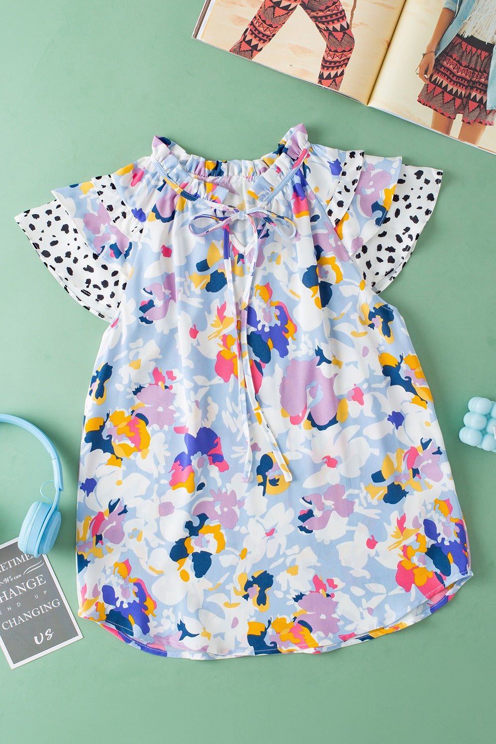 Ruffled Printed Tie Neck Cap Sleeve Blouse - Kristi Pierce Designs