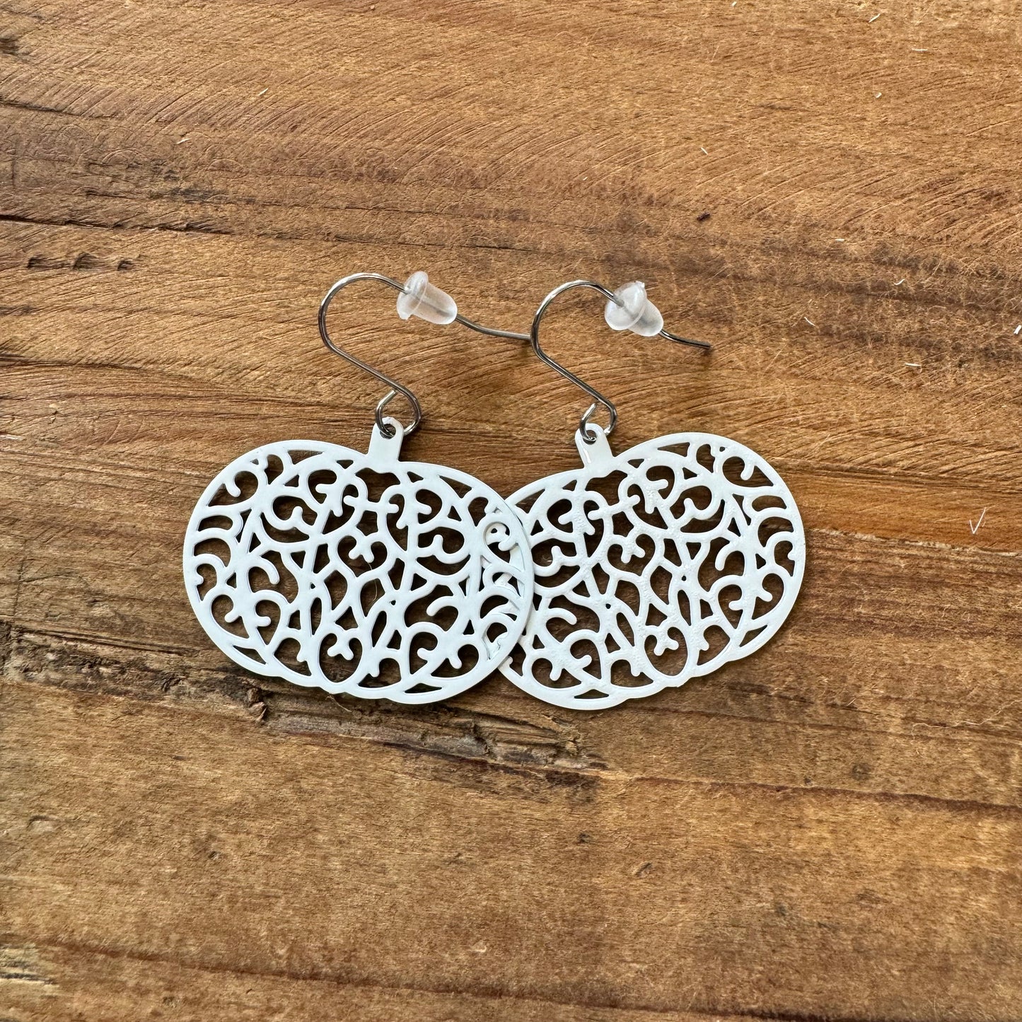 White Metal Cutout Pumpkin Earrings