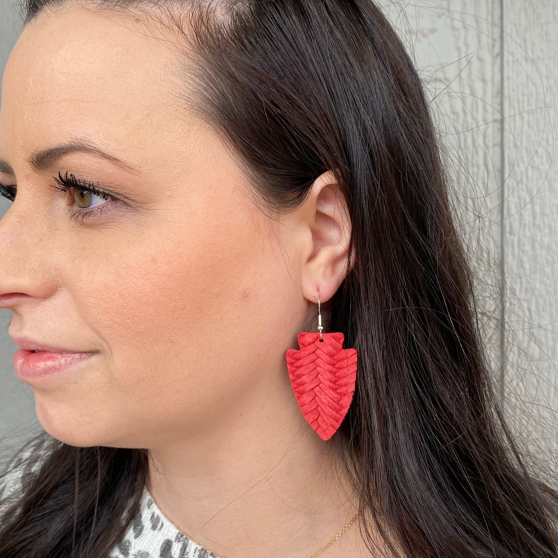 Red Braided Leather Kansas City Chiefs Arrowhead Earring on Model