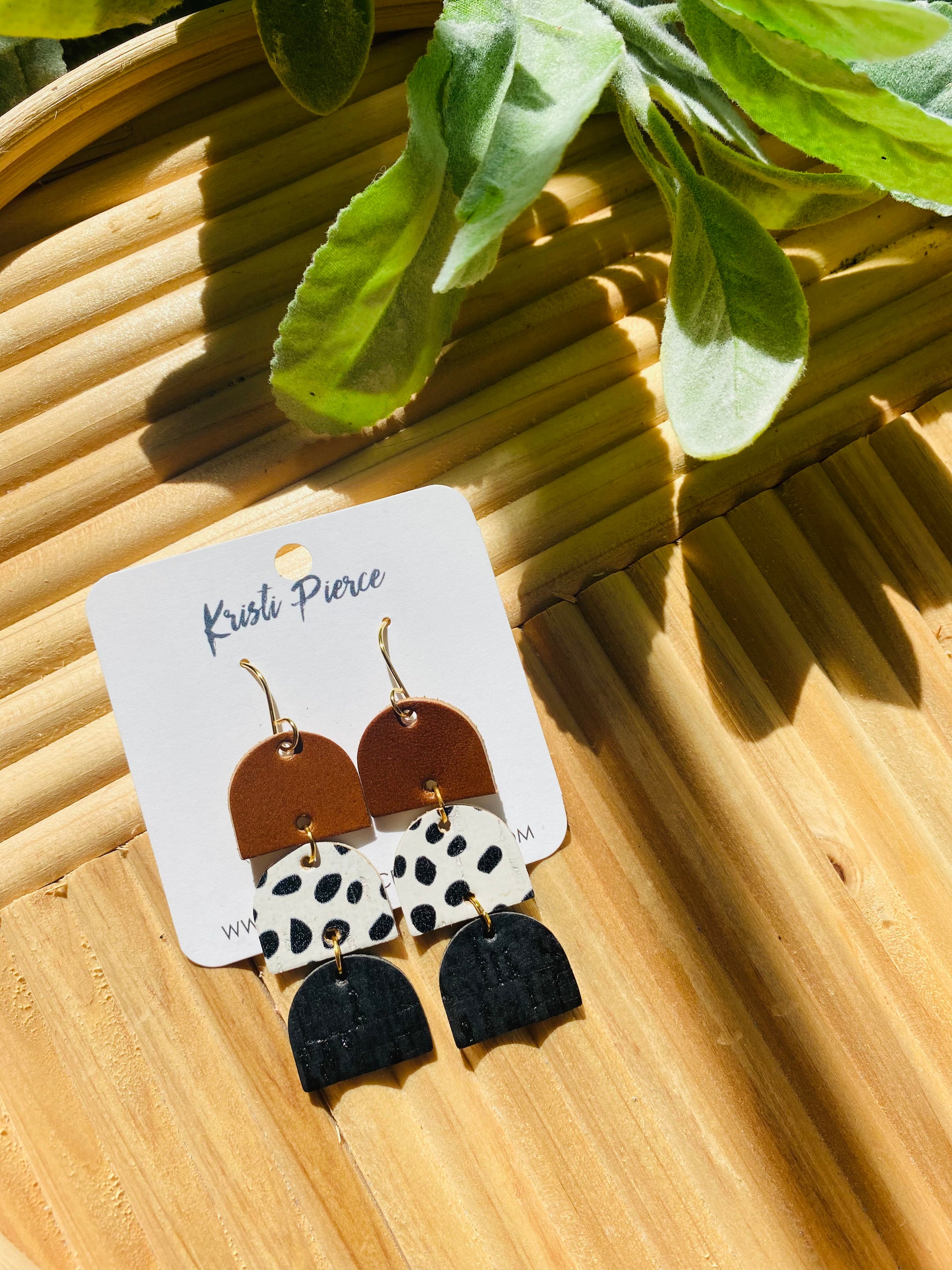 Dome-shaped leather trio dangle earrings by Kristi Pierce Designs